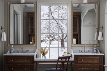 Bathroom with a window between two vanities in a Utah home [1440x1799]