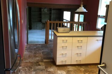 Amateur kitchen porn. We redid our kitchen, and I built a banquette bench where the railing was.