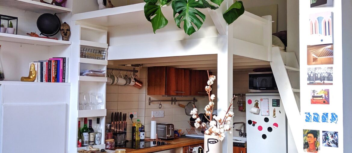 Compact kitchen under a mezzanine bedroom in a 400 square feet studio apartment, Notting Hill, West London, UK [3024x4032]