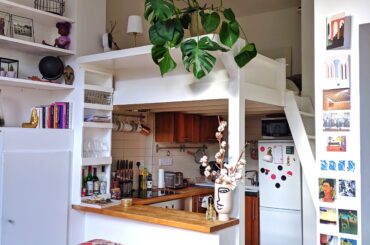 Compact kitchen under a mezzanine bedroom in a 400 square feet studio apartment, Notting Hill, West London, UK [3024x4032]