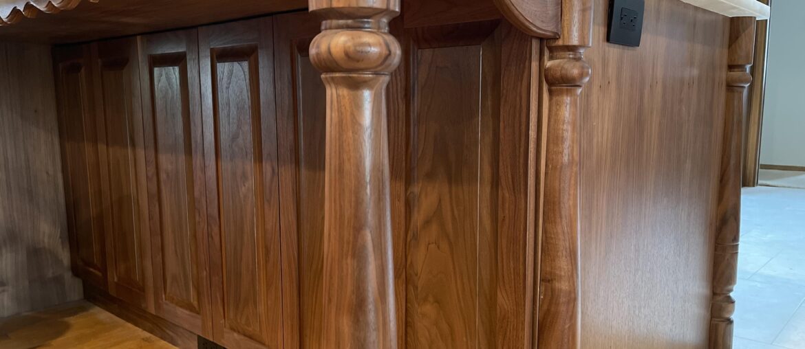 Solid walnut cabinetry I built to match the rest of house.