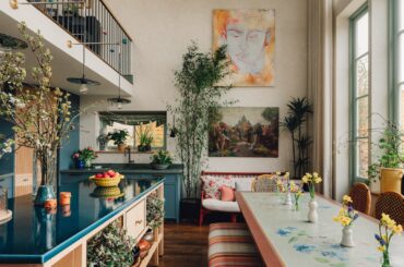 Kitchen under a mezzanine and a dining space in a renovated 1930s house, southwest London, UK [2450x1378]