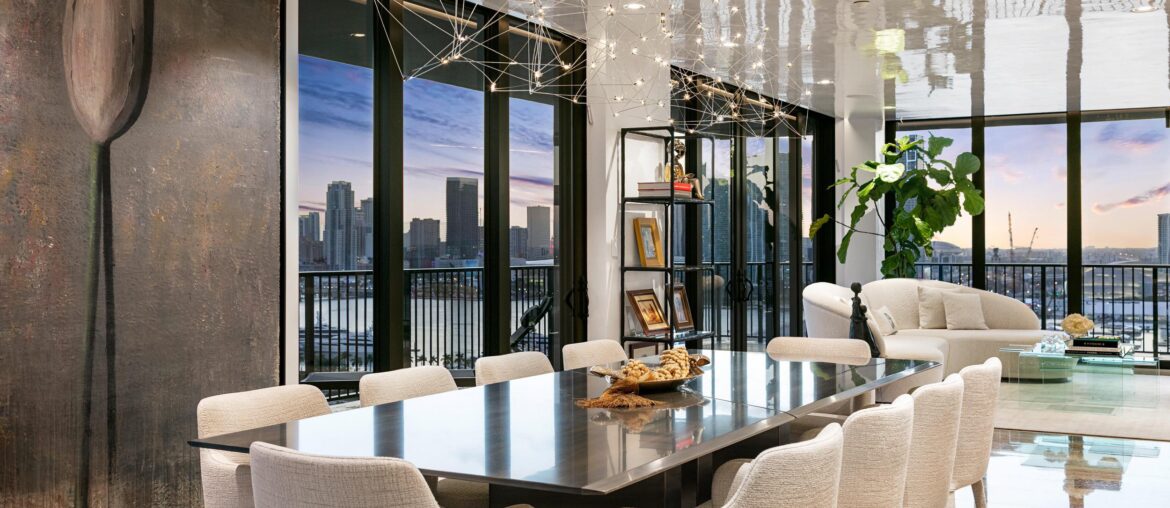 Contemporary Penthouse Formal Dining Room with Twilight Downtown Miami Skyline Background [1667 x 2500]