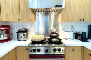 This is not exactly kitchen-porny, but I made a small upgrade to my kitchen by getting a proper range hood installed, which makes my kitchen feel much more complete and functional now!