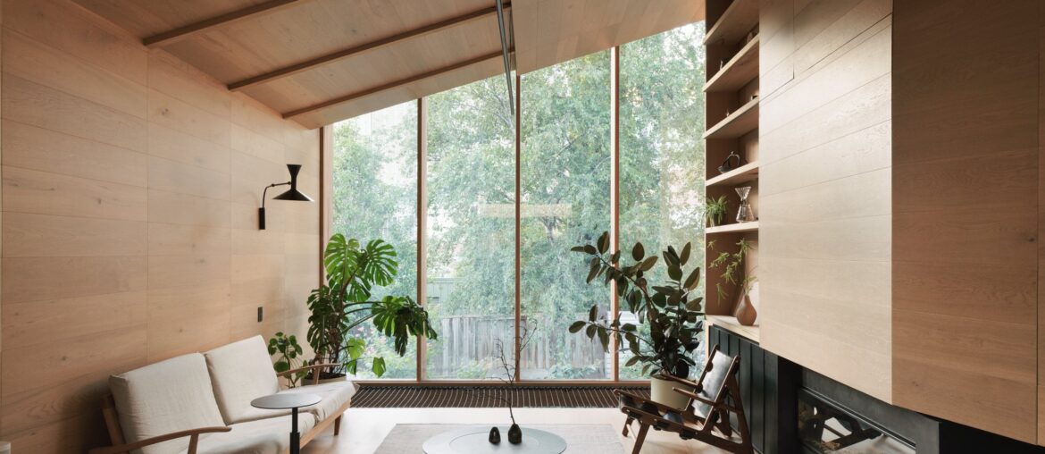Living space overlooking the garden in a two-story timber extension added to a Victorian home, Carlton, Melbourne, Australia [2500x1667]