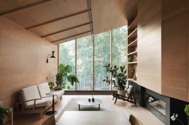 Living space overlooking the garden in a two-story timber extension added to a Victorian home, Carlton, Melbourne, Australia [2500x1667]