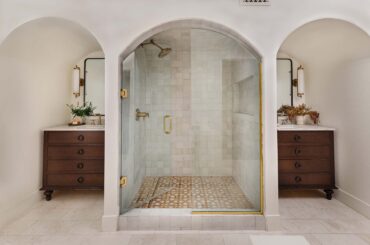 Arched vanity nook on both sides of a shower in a Spanish Revival residence, Scottsdale, Arizona [1800x1200]