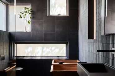 Black bathroom in a renovated 90s home, Woollahra, Eastern Suburbs of Sydney, Australia [1334x2000]