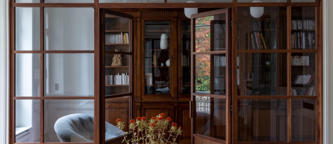 Partition between the home library and main living space in an 1860 apartment near Bois de Vincennes at the eastern edge of Paris, France [2364x3543]