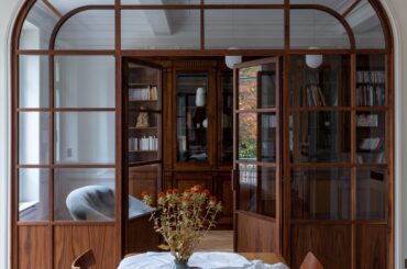 Partition between the home library and main living space in an 1860 apartment near Bois de Vincennes at the eastern edge of Paris, France [2364x3543]