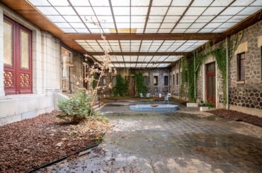 Roofed courtyard of an abandoned luxury bathhouse in France [5954x3969] [OC]