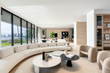 Living Room with Floor to Ceiling Glass Sliding Doors in Miami Beach Home [4889×3278]