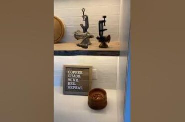 face frame cabinetry, hand hewn shelves, custom range hood and waterfall island countertop