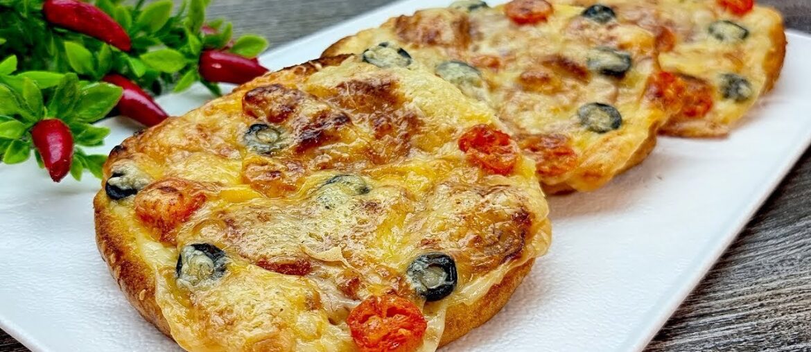 Baguette Delite: Gourmet Sandwich with Ham, Two Kinds of Cheese, and Mediterranean Toppings "Baguette Delite: Gourmet Sandwich with Ham, Two Kinds of Cheese, and Mediterranean Toppings"