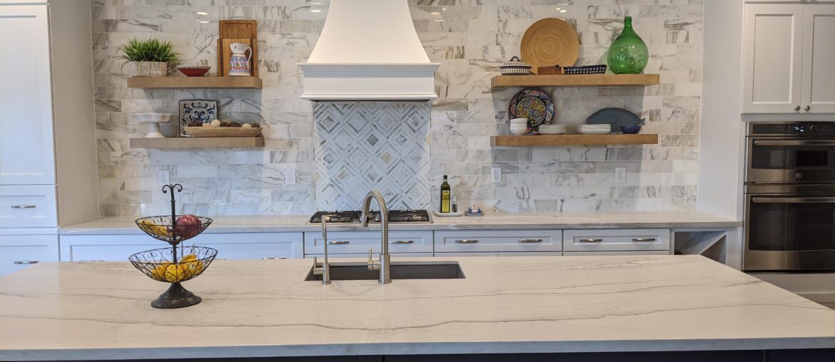 Can't decide if I like the tile behind the stove with this kitchen....thoughts?