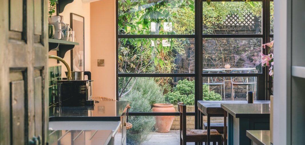 Kitchen extension with skylights added to a four double-bedroom Victorian terrace near Clapham, Lambeth, London, UK [1067x1600]
