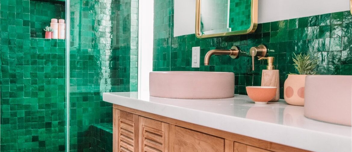 Green zellige tile shower and backsplash in a renovated bathroom of a Los Angeles home [1200x1600]