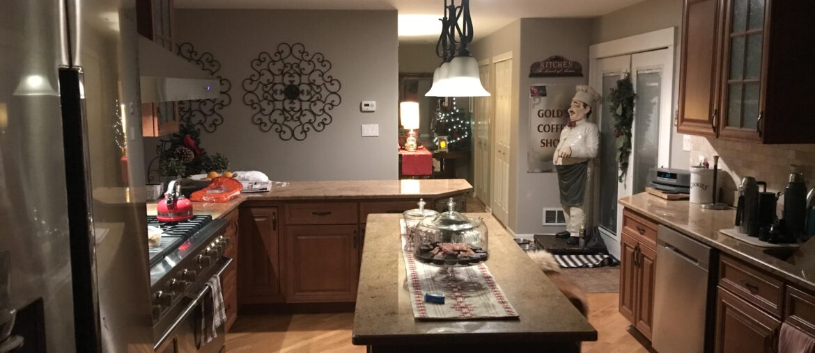 My kitchen during Christmas. 60in Viking range. Samsung refrigerator (biggest model they make) also pull out type drawer microwave in the island. Got the stove brand new for 8k on sale. Brand new 18k. I LOVE TO COOK. This remodel was all done myself.