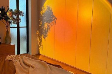 A room beautifully lit by a sunset lamp [1204 x 113]