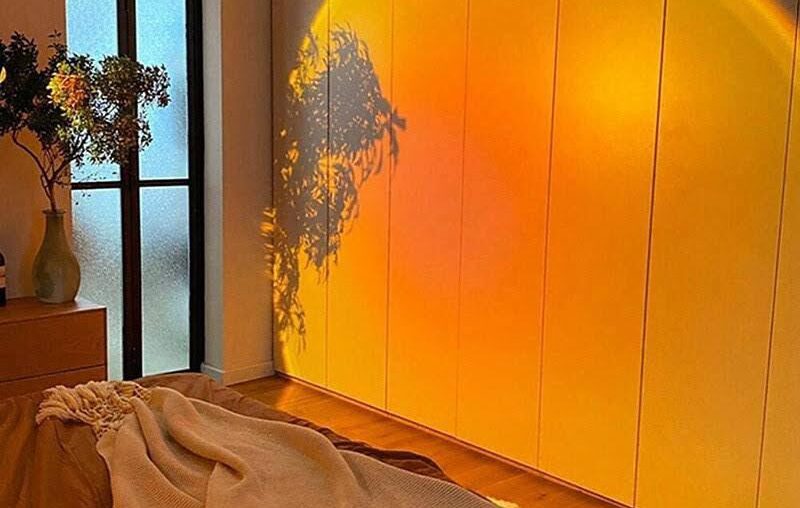 A room beautifully lit by a sunset lamp [1204 x 113]