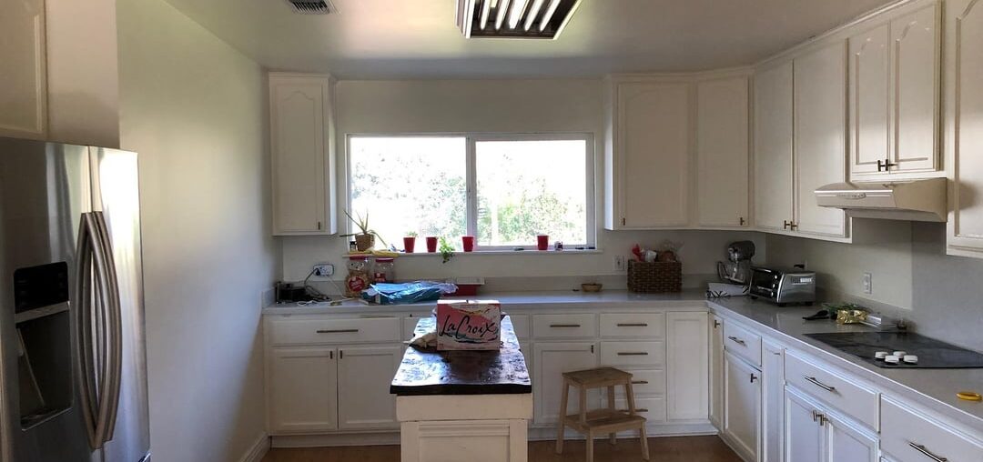 We took a 1950's ranch house and blended hyper minimal design with steampunk materials. The concept: Stark Punk