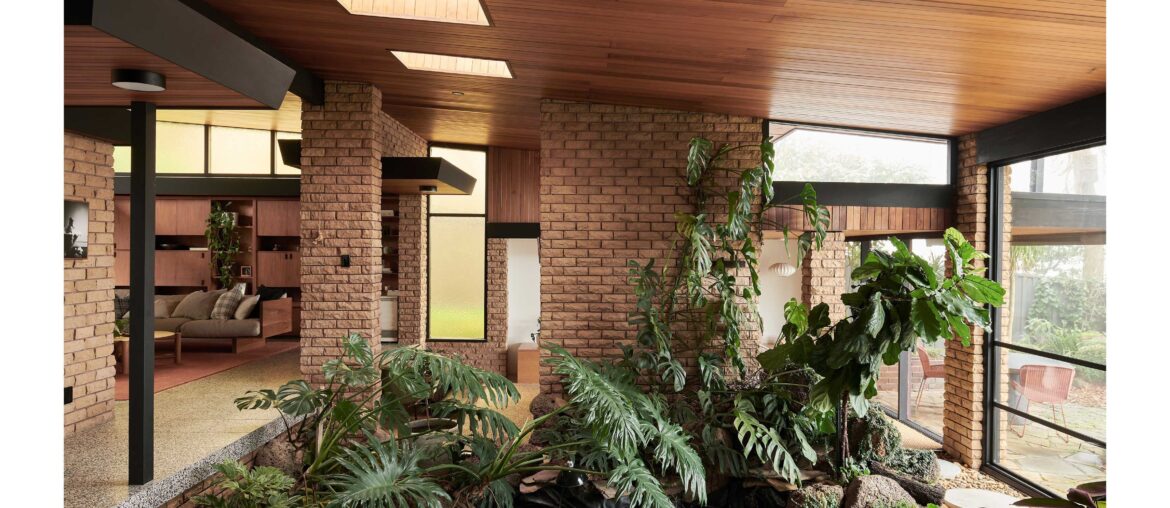 Indoor garden in a restored and renovated Mid-century modern residence with timber paneling and exposed brick, Ferny Creek, Melbourne, Victoria, Australia [3467x1947]