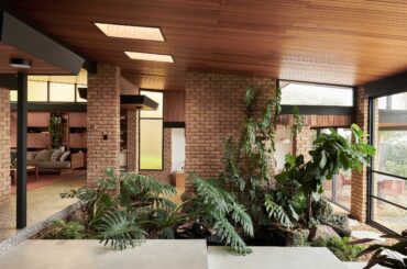 Indoor garden in a restored and renovated Mid-century modern residence with timber paneling and exposed brick, Ferny Creek, Melbourne, Victoria, Australia [3467x1947]