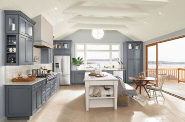 We're remodeling our kitchen and we really like the tile backsplash in this photo, but we don't know where to buy it. It's from the Merillat cabinets catalog, and we emailed them but haven't heard back. Does anyone recognize it?