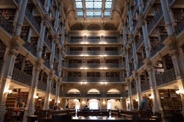 The main room at the Peabody Library in Baltimore, Maryland [2048 x 1463]