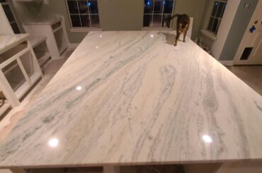 Our quartzite was installed yesterday! This is Mont Blanc Cherry and the island slab is a seamless 5' 8.25" x 8' 3.5". I live in a house on stilts and it took nine people two hours (and three holes in the stairwell walls) to get this beautiful piece installed. Can't wait for the kitchen to be finis