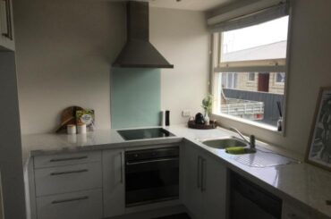 Help! I want to tile the back wall of my kitchen in the new apartment I just brought...Floor tiles are black, counter and cabinets are white. I want something unique and busy. I was originally going to do something “Mediterranean” as a splashback feature...but now not sure. Any ideas?