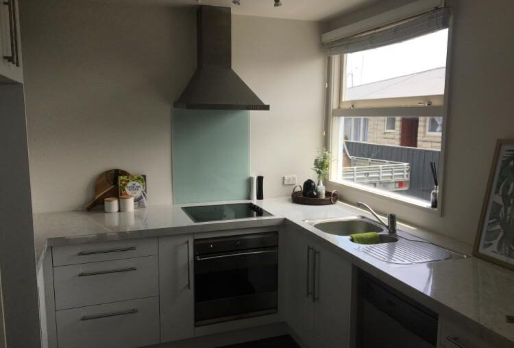 Help! I want to tile the back wall of my kitchen in the new apartment I just brought...Floor tiles are black, counter and cabinets are white. I want something unique and busy. I was originally going to do something “Mediterranean” as a splashback feature...but now not sure. Any ideas?