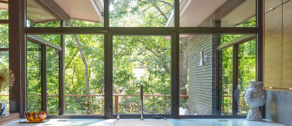 Tall kitchen full of natural light with views of trees, Little Forest Hills, east Dallas, Texas [2000x2998]