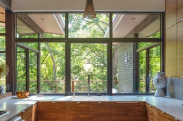 Tall kitchen full of natural light with views of trees, Little Forest Hills, east Dallas, Texas [2000x2998]