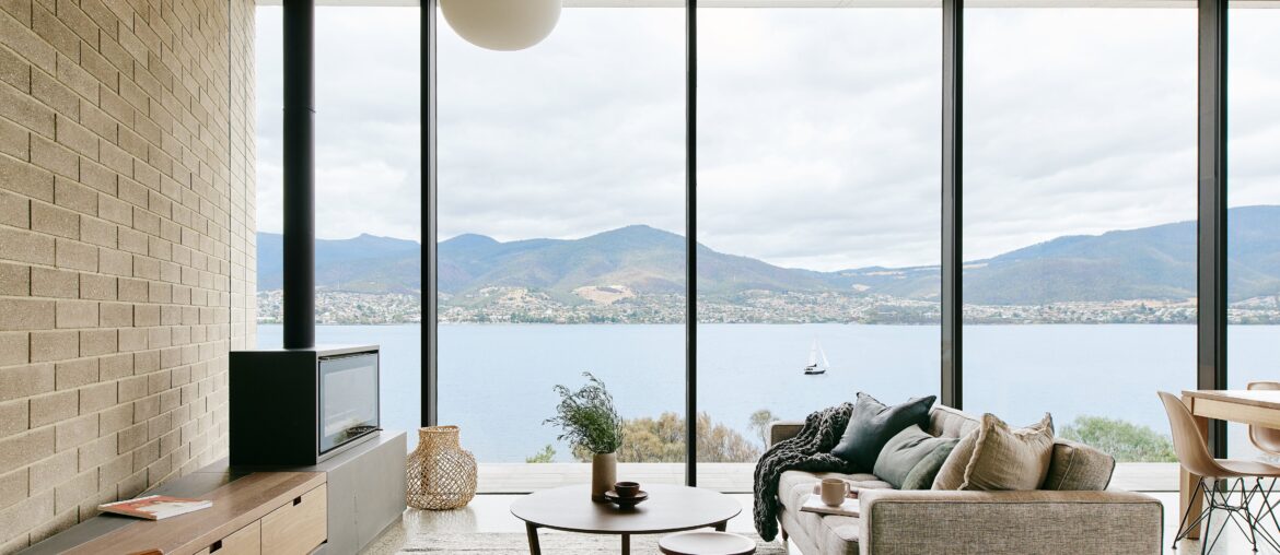 Living room with floor-to-ceiling windows overlooking the River Derwent, Tasmania, Australia [4370x2917]