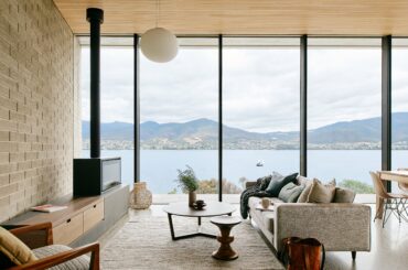 Living room with floor-to-ceiling windows overlooking the River Derwent, Tasmania, Australia [4370x2917]