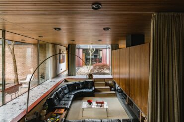 Sunken conversation pit in a modern residence with a courtyard garden designed by architect David Shelley in 1970, Nottinghamshire, East Midlands, England [2400x1500]