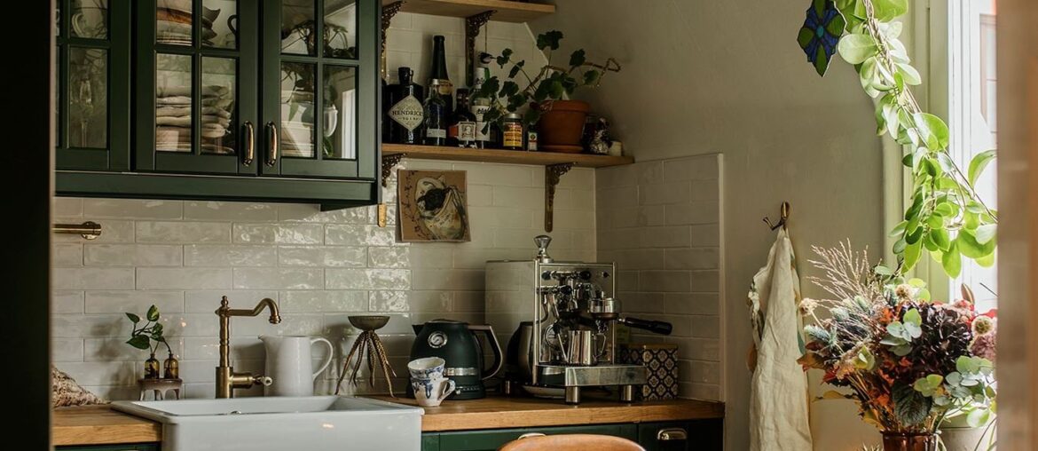 Compact kitchen with windows in an attic apartment, Södermalm, central Stockholm, Sweden [1378x2067]