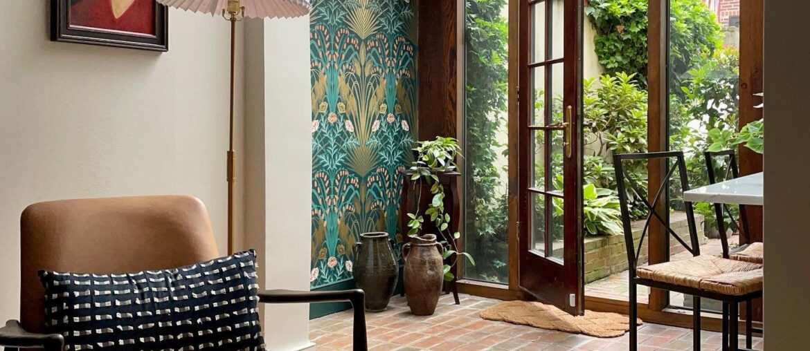 Sunroom opening up to the garden in a Philadelphia home, Pennsylvania [1440x1799]