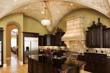 Beautifully vaulted ceiling over castle-esque kitchen