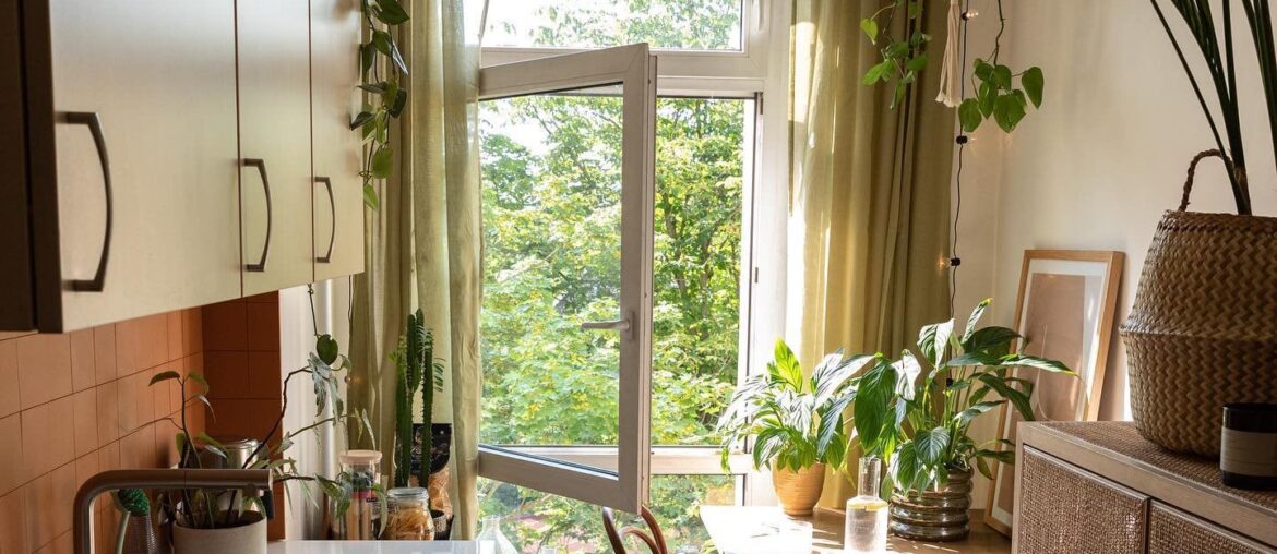 Kitchen and dining space with natural light in a Berlin apartment, Germany [1440x1800]