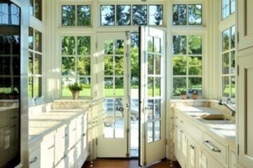 Natural light kitchen built into a sunroom