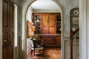 Arched entrances next to the entryway in a renovated Colonial-style house, Athens, Georgia [1250x1875]
