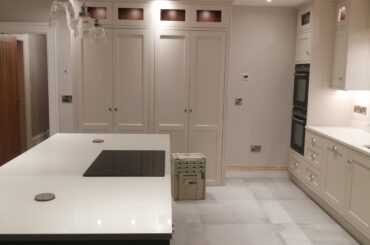 A really nice kitchen me and my boss made and sprayed. 30mm thick door and right hand tall unit leads to a walkin larger.