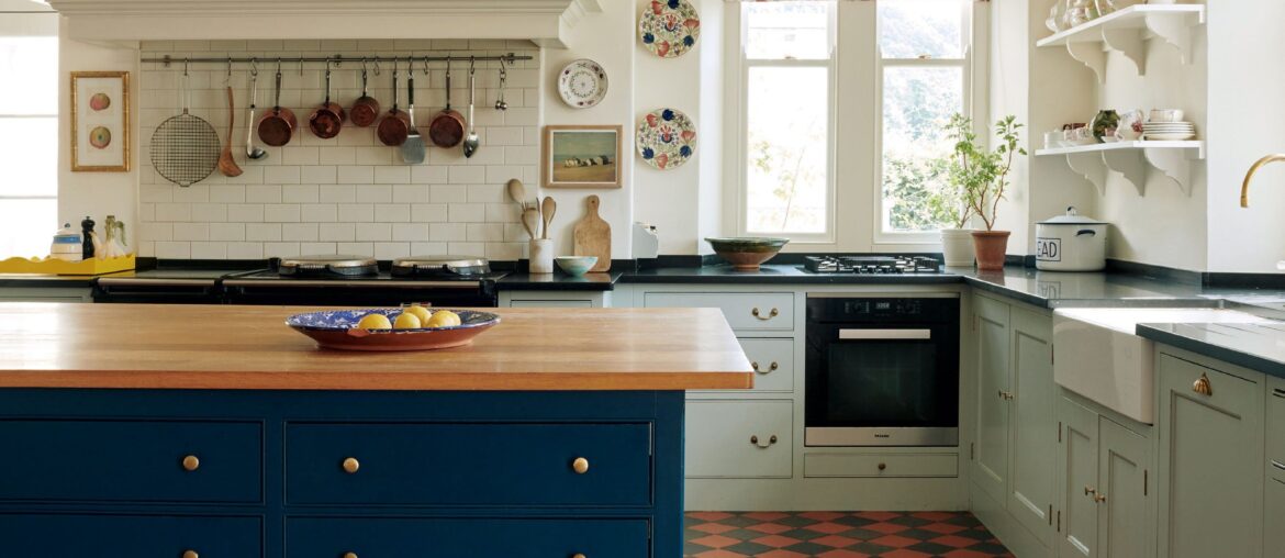 Kitchen with a checkerboard terracotta floor in a renovated 1890s Victorian country house, North York Moors, Yorkshire, England [2636x3440]