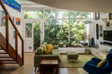 Living room with garden views in a two-bedroom terrace houes, Camden, northwest London, UK [2400x1602]
