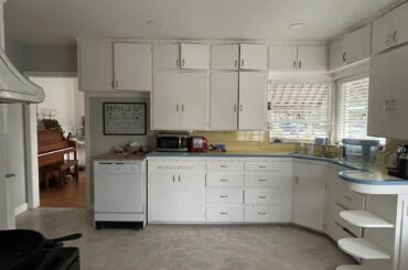 This old kitchen got a refresh but we kept some 50's style. We call it 'Bright Harmony'!