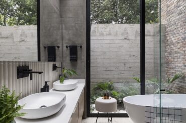 Exposed concrete wall bathroom full of natural light, Subachoque, Western Savanna Province, Colombia [2500x3751]