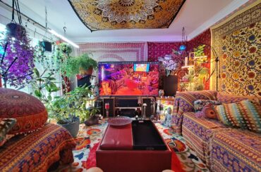 My psychedelic living room in Nashville. The image on the tv is the room at night. [4000x3000]