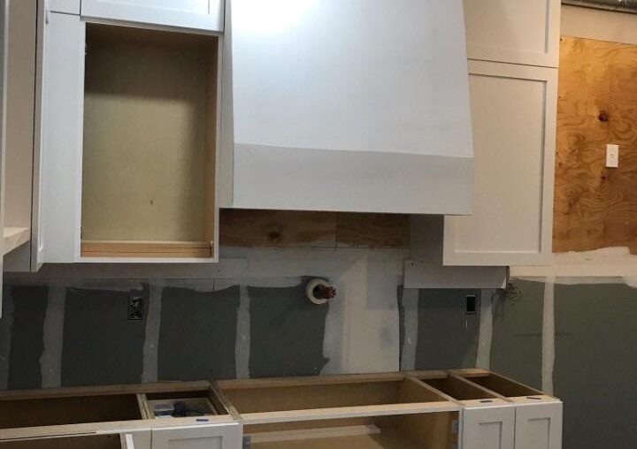 Our slide in rangetop is 8.5” tall but this base cabinet cut out is 11” tall - how would one adjust to keep the rangetop flush with or higher than the counter tops when installed?